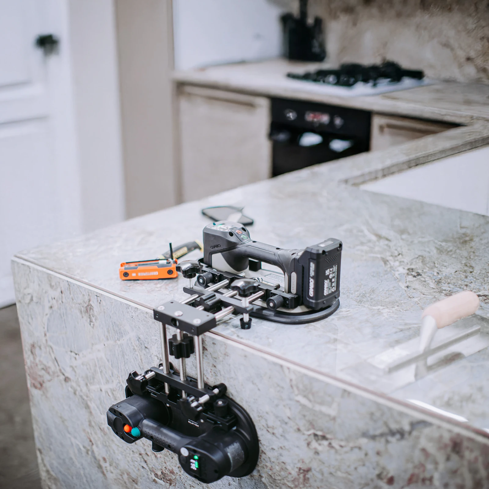 GRABO 90 Degree Seam Setter V2 aligning a stone worktop edge