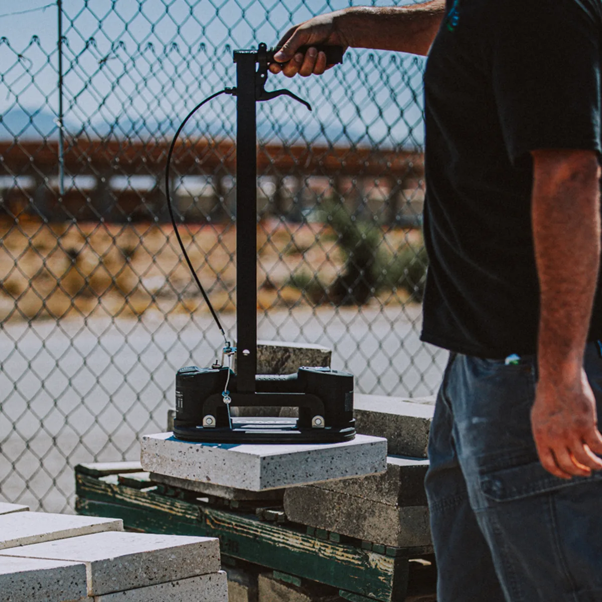 Erguo S1 lifting a concrete slab from a pallet