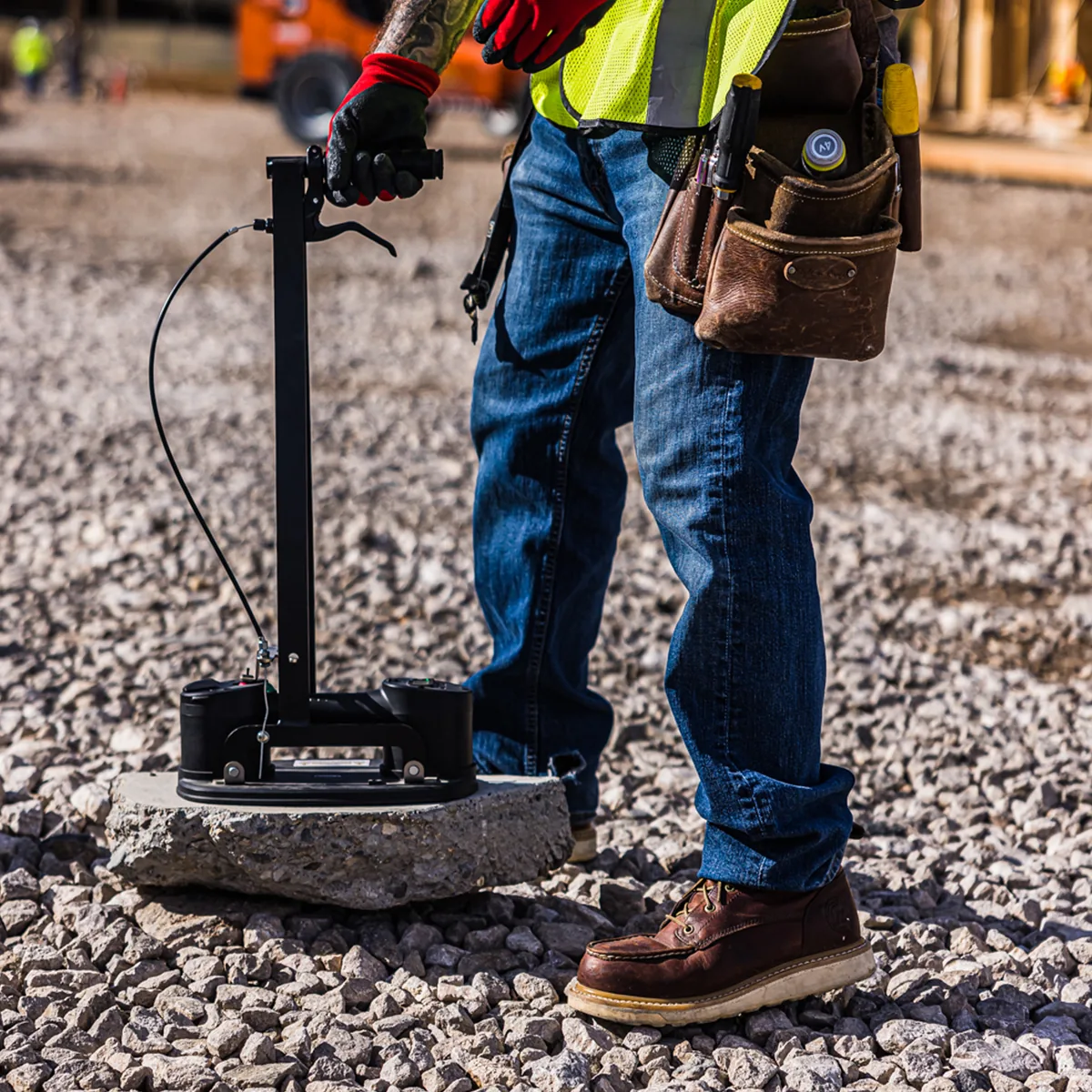 Erguo S1 handling a stone slab on gravel