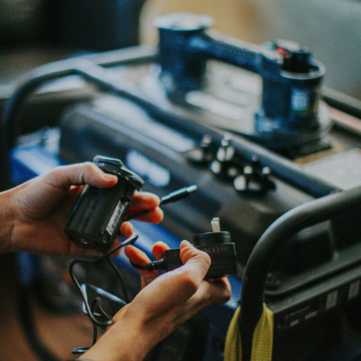 GRABO® battery being connected to its charger on site