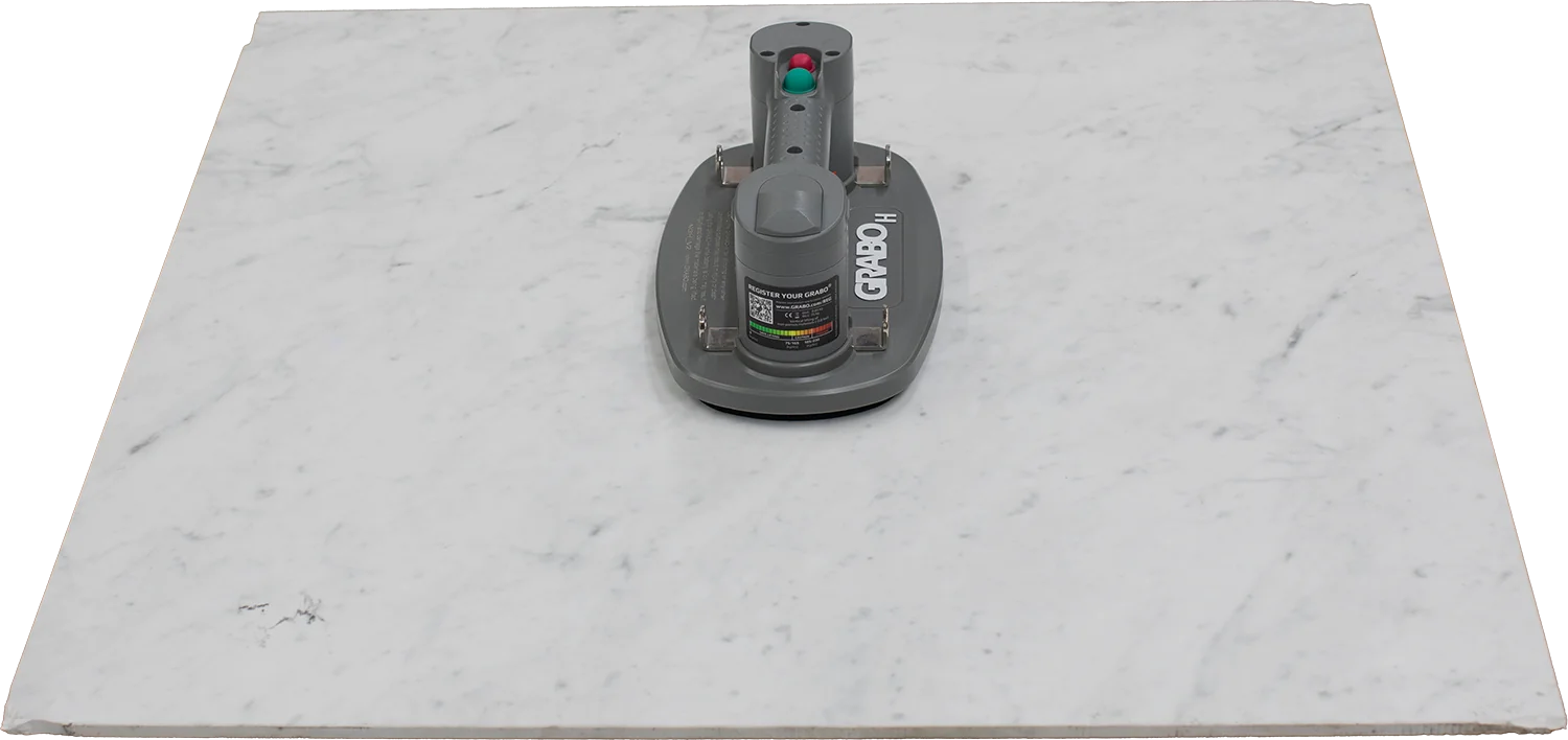 GRABO® H V2 lifting a stone slab in perpendicular hold