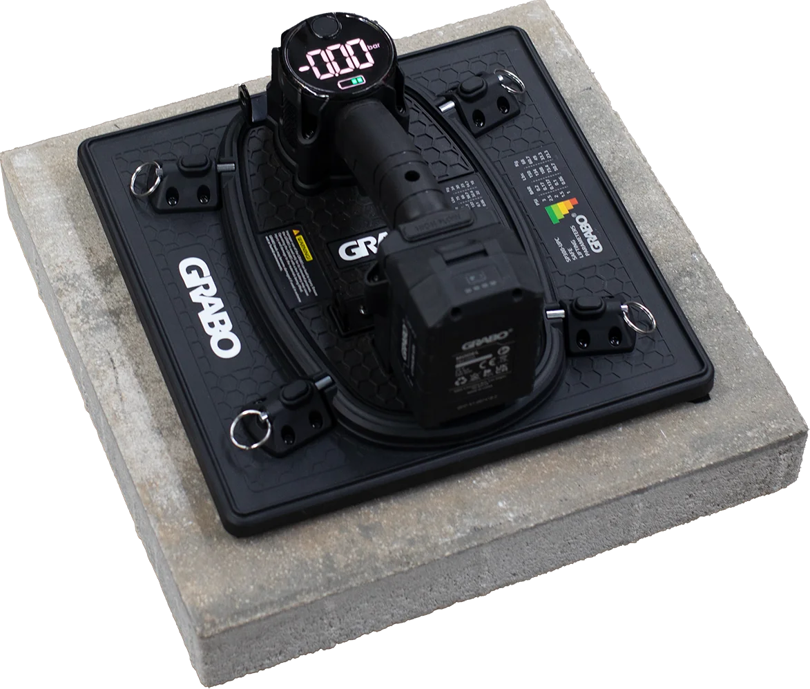 GRABO® HighFlow lifting a stone slab in perpendicular hold