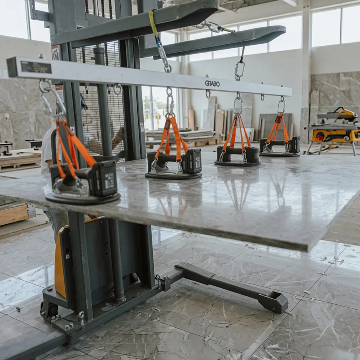 GRABO® U-Hoist lifting a polished stone slab indoors