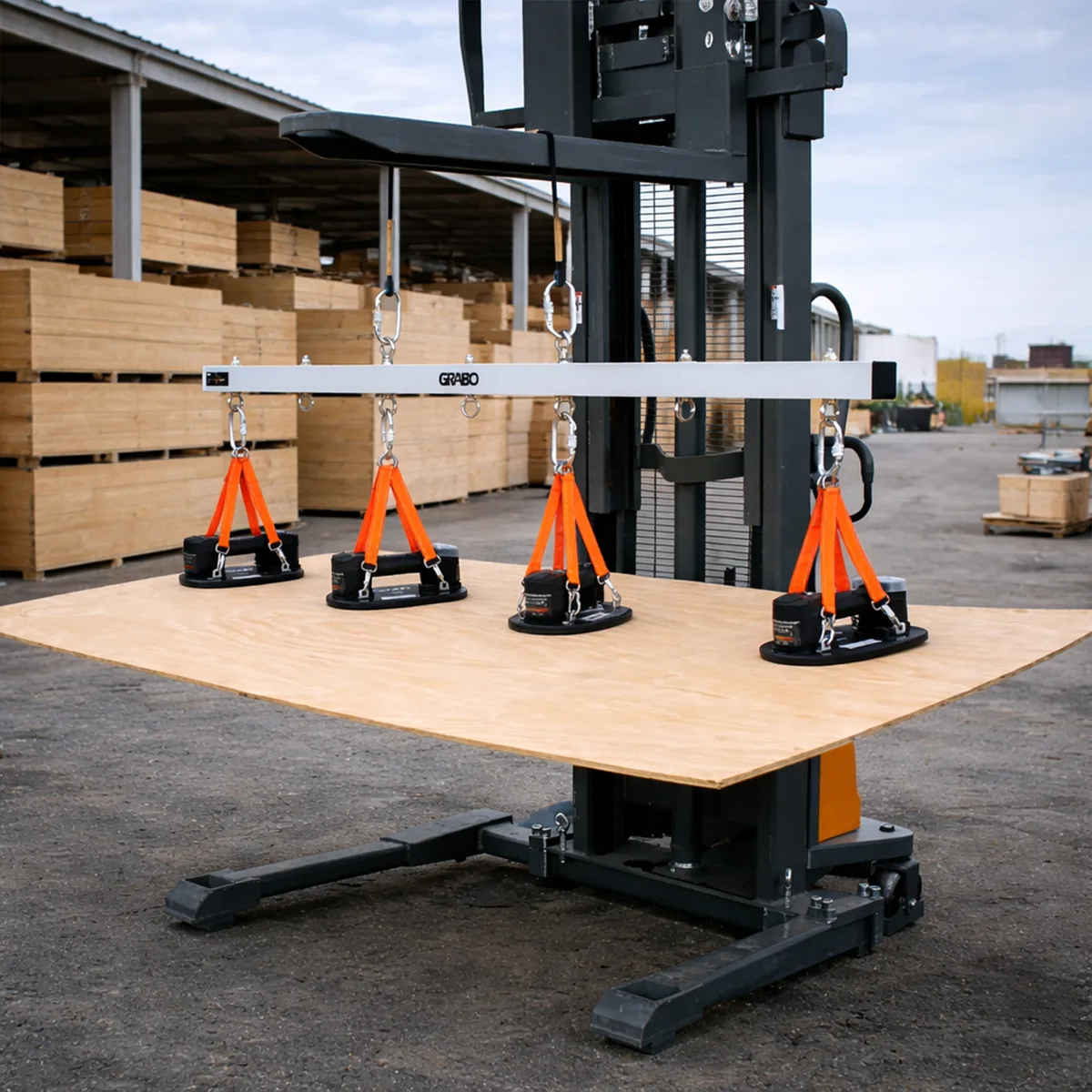 GRABO® U-Hoist carrying a plywood sheet at a timber yard